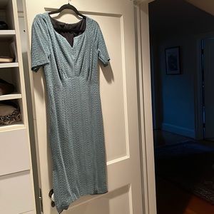 Classic silhouette with a kick pleat to show off your legs